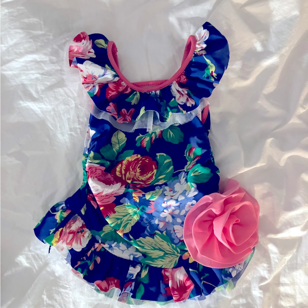 Floral skirted one piece, peagant appropriate